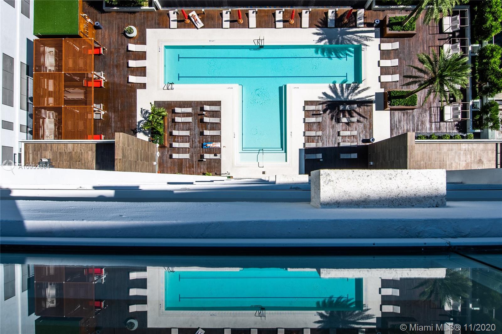 The Bond Miami, FL 33131 - Photo 12 of 19 a view of entryway and hall with wooden floor