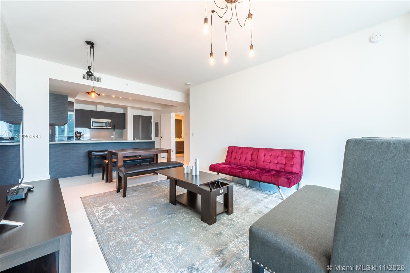 The Bond Miami, FL 33131 - Photo 3 of 19 a living room with furniture and wooden floor