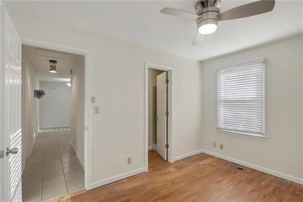 a view of an empty room with a window