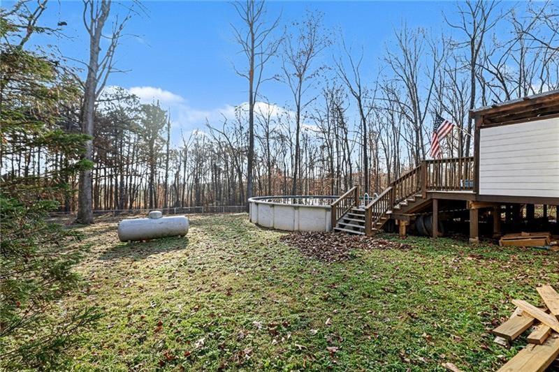 3800 Tyus Carrollton Road Carrollton, GA 30117 - Photo 30 of 36 a view of a backyard with sitting area
