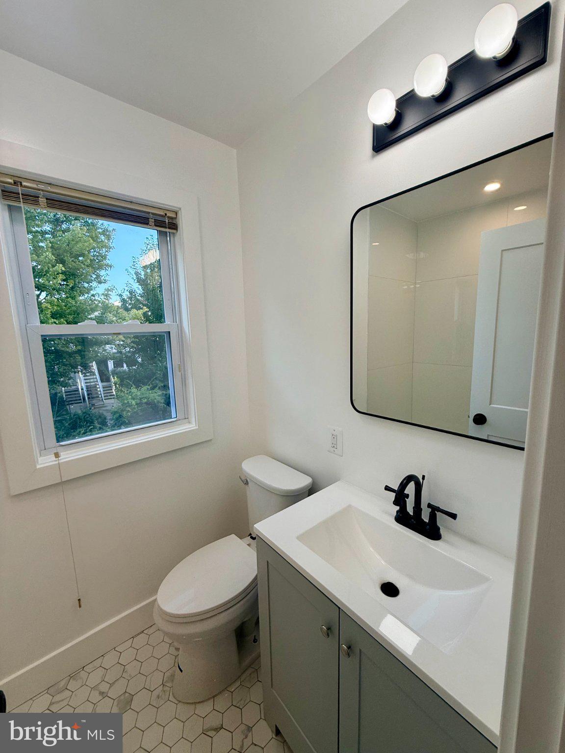 2920 8th Street Northeast, Unit 2 Washington, DC 20017 - Photo 12 of 30 Bright and modern bathroom oasis.