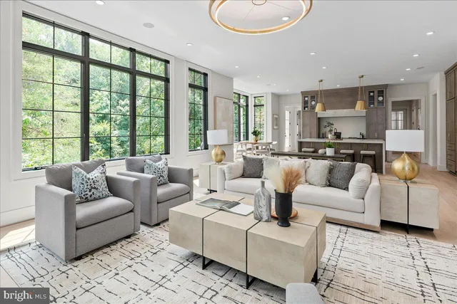 a large kitchen with a table and chairs in it