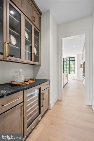 a view of a room with stairs and windows
