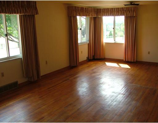 2 Greenview Drive McKees Rocks, PA 15136 - Photo 4 of 10 Other. Additional view of the living/diniong room and the three large windows that provide a lot of natural light!