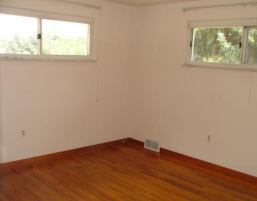 2 Greenview Drive McKees Rocks, PA 15136 - Photo 6 of 10 Master Bedroom. Hardwood floors and high windows for privacy in the master bedroom