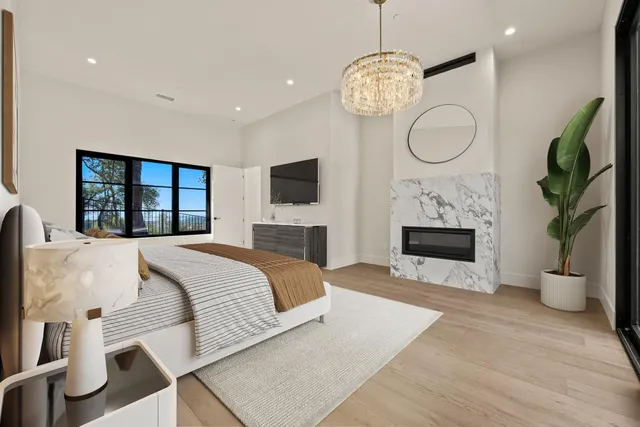 a bathroom with a sink a mirror and a bathtub