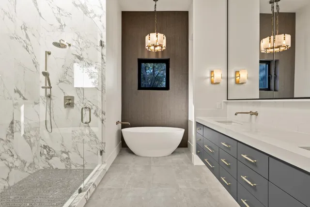 a bathroom with a granite countertop sink mirror and double