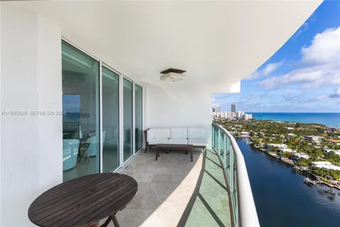 a view of a balcony and chair