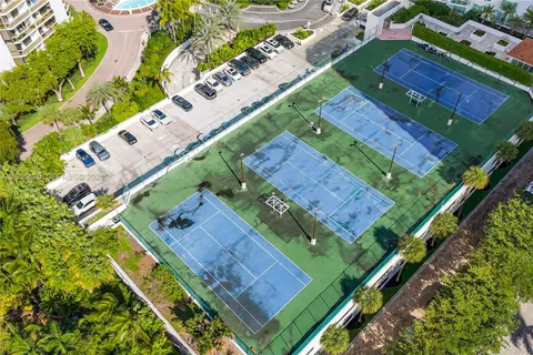 a living room with furniture and a washer dryer