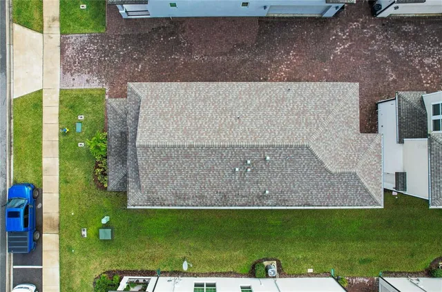 a view of swimming pool with a yard