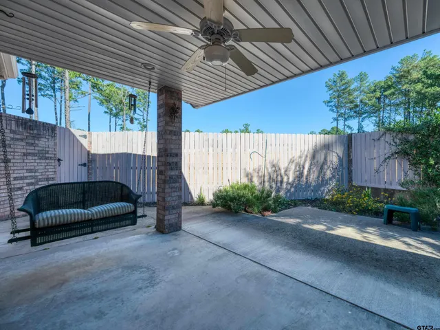 a bedroom with furniture and a garden