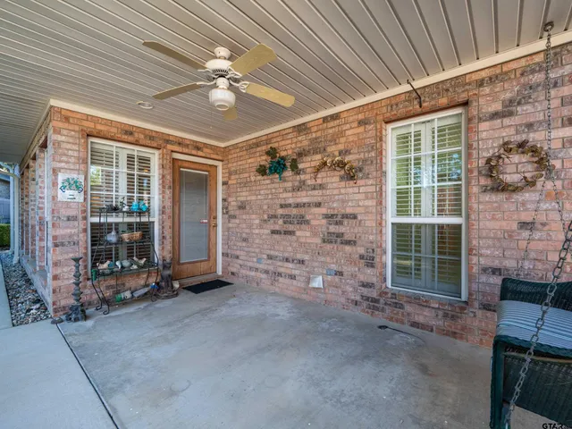 a view of a room with wooden walls
