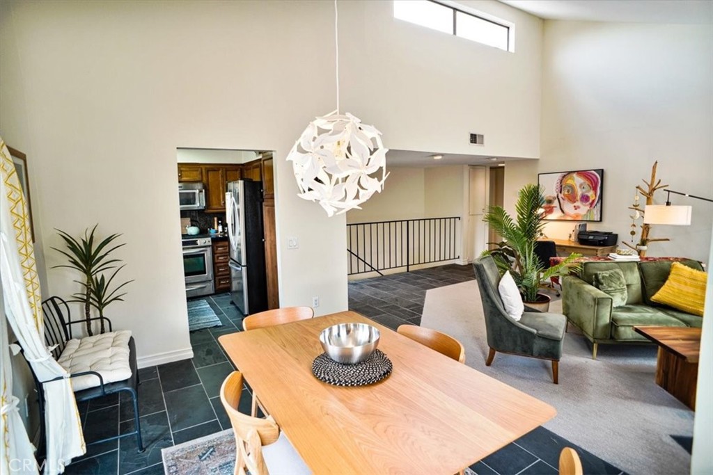 31311 The Old Road, Unit E Castaic, CA 91384 - Photo 7 of 19 a living room with furniture and a table
