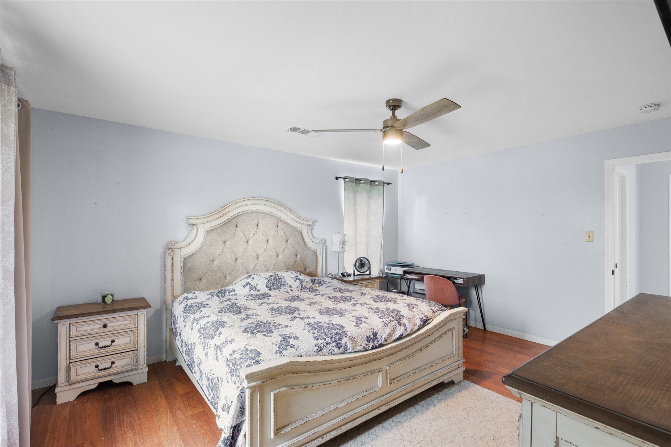 1015 FM 112 Road Lexington, TX 78947 - Photo 13 of 38 a bedroom with a bed and dresser