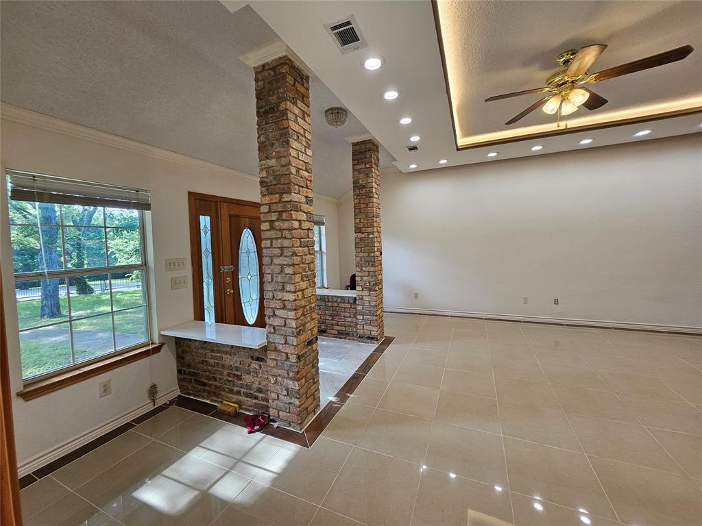 234 East Fork Road Sunnyvale, TX 75182 - Photo 4 of 32 a view of an entryway with brick walls