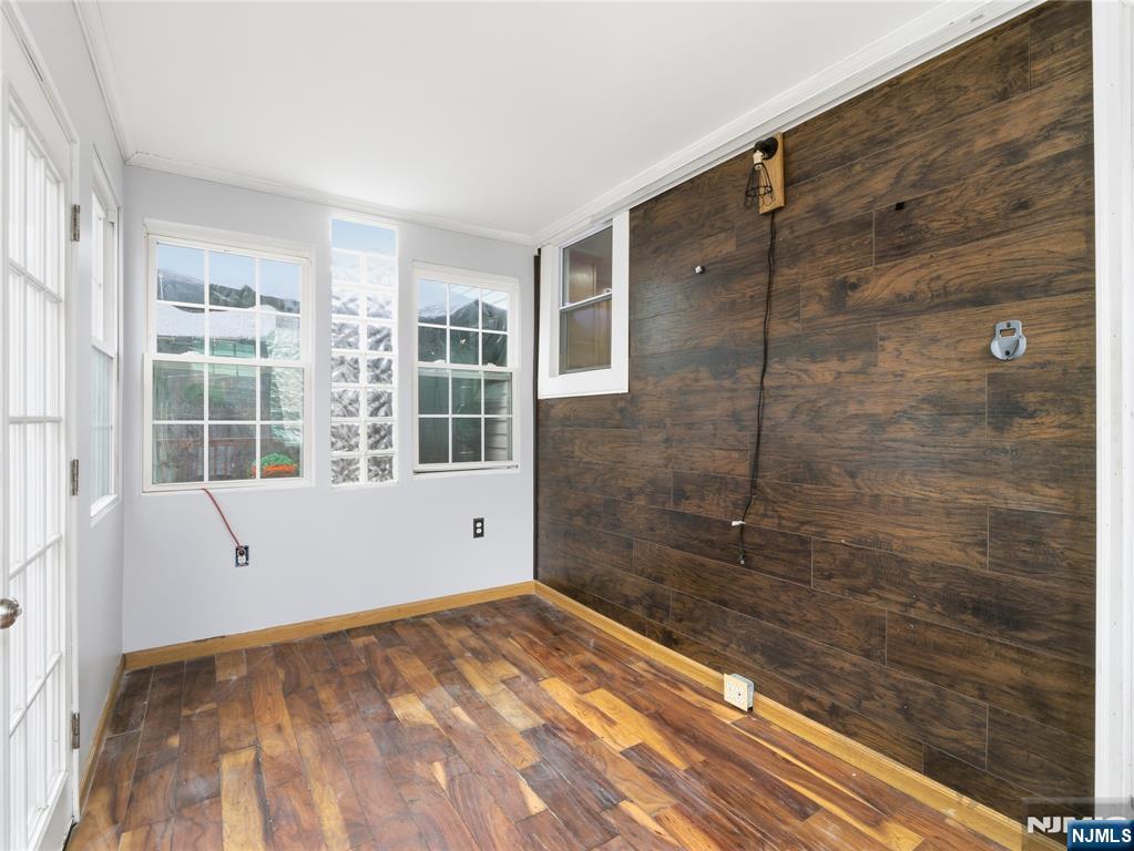 153 Arlington Avenue Paterson, NJ 07502 - Photo 10 of 12 a view of a bathroom with a bathtub