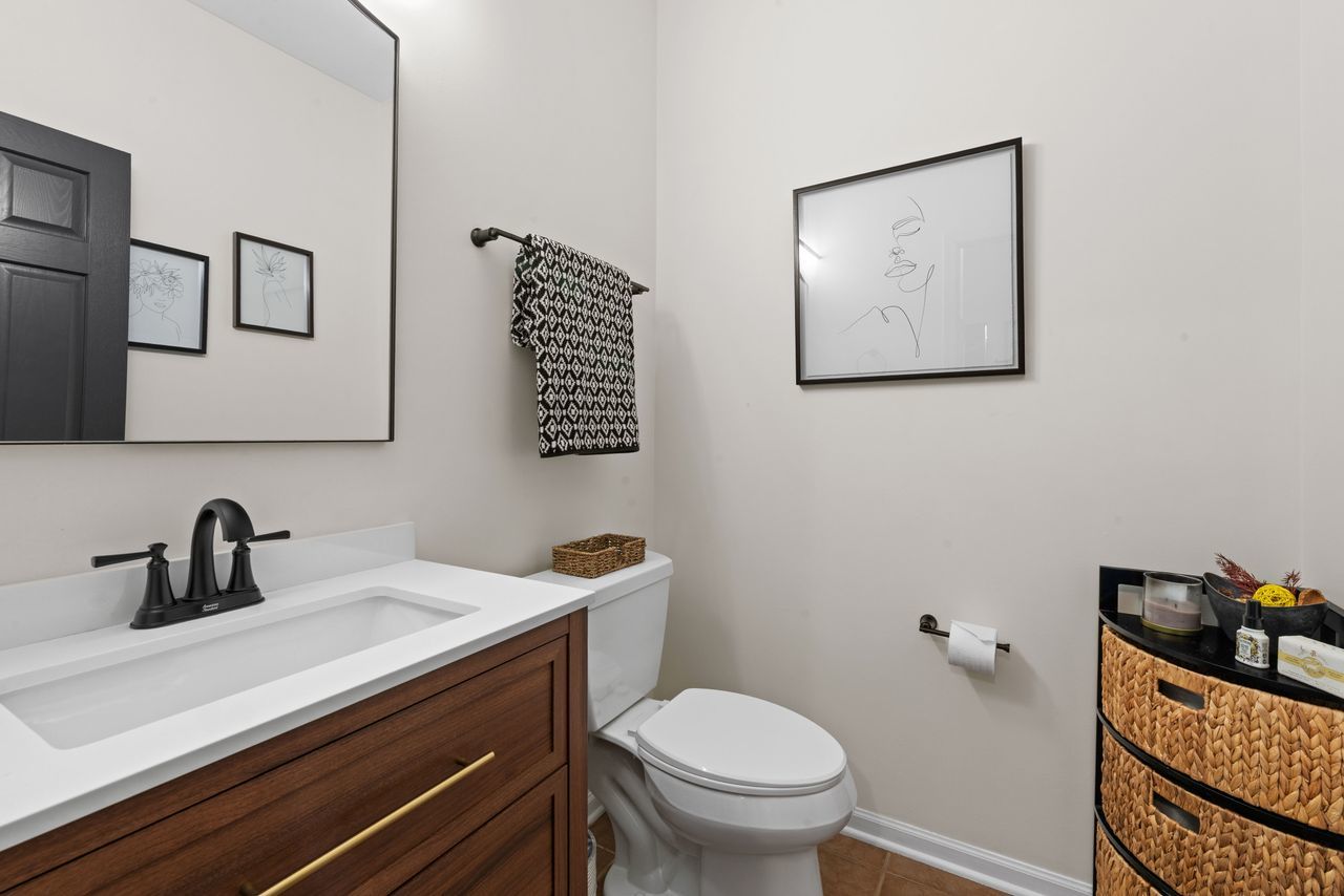 2561 Hennig Road Hampshire, IL 60140 - Photo 11 of 36 a bathroom with a sink and a toilet