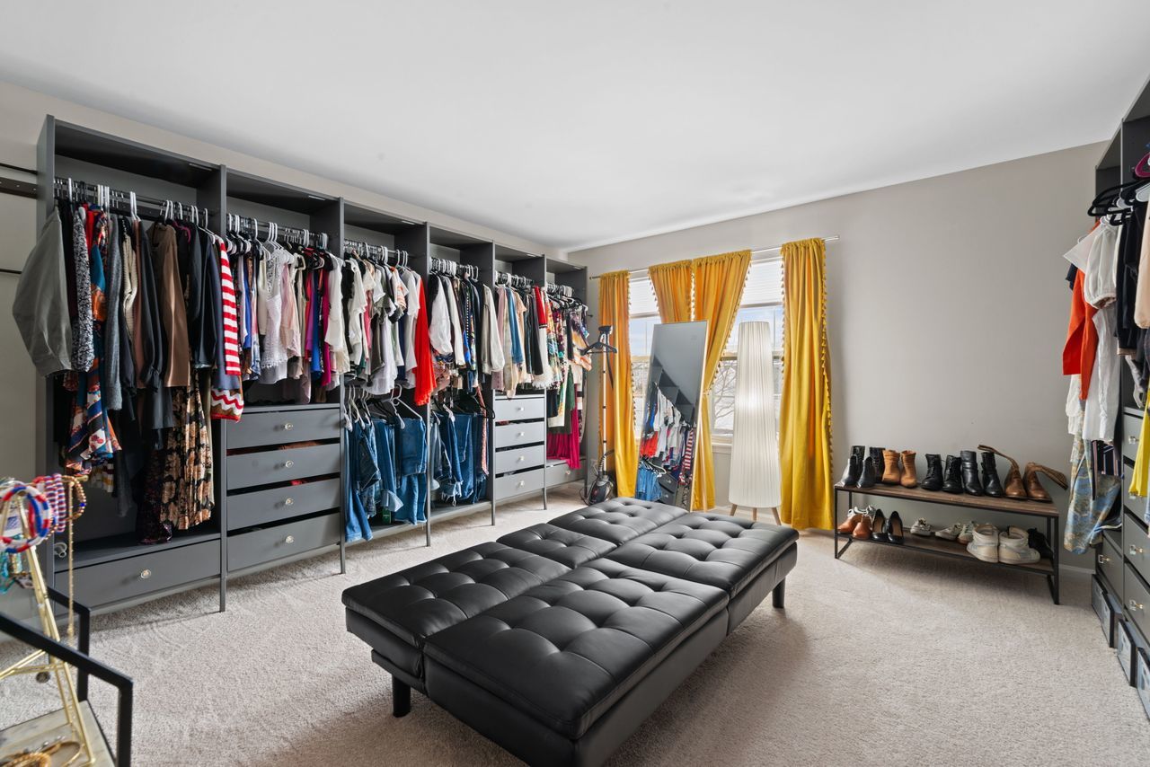 2561 Hennig Road Hampshire, IL 60140 - Photo 17 of 36 a bed room with a bed and a chair