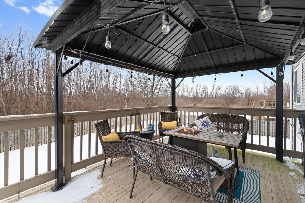 2561 Hennig Road Hampshire, IL 60140 - Photo 29 of 36 a view of sitting area with furniture and wooden deck