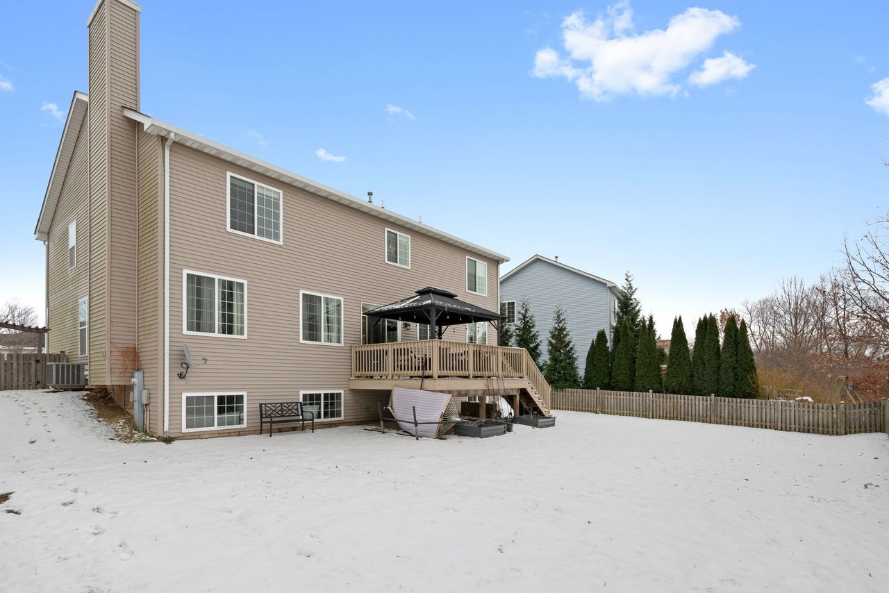 2561 Hennig Road Hampshire, IL 60140 - Photo 30 of 36 a view of a house with a snow in the yard