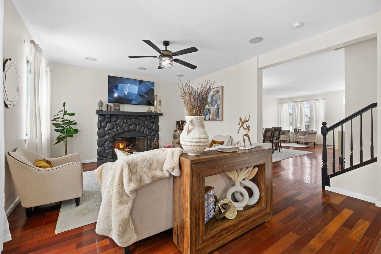 2561 Hennig Road Hampshire, IL 60140 - Photo 9 of 36 a living room with furniture and a fireplace