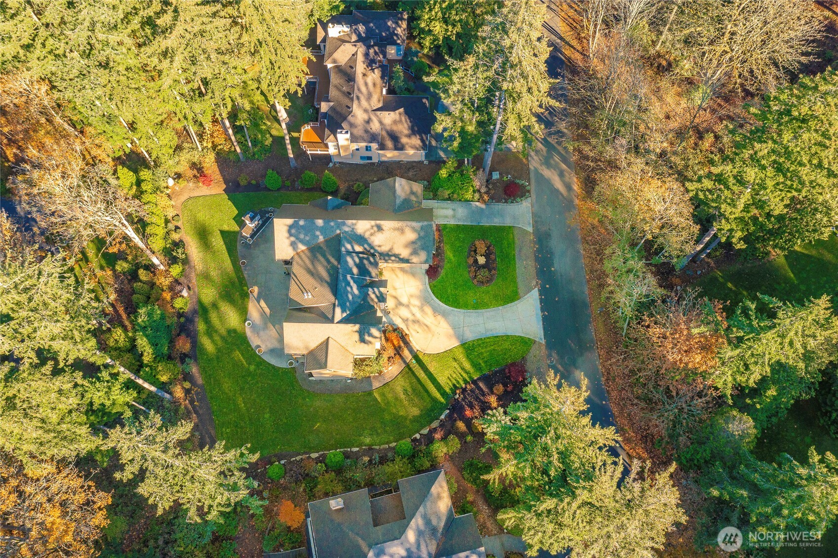 9125 Shearwater Road Blaine, WA 98230 - Photo 39 of 40 an aerial view of a house with a yard and garden