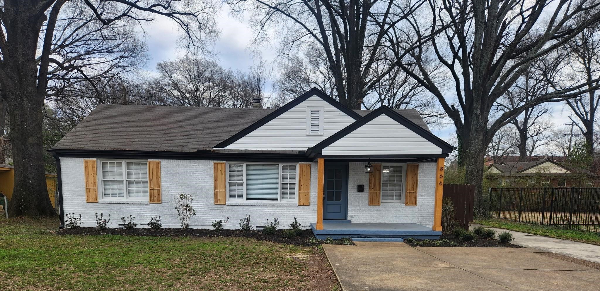 866 Colonial Road Memphis, TN 38117 - Photo 1 of 15 View of front of property featuring covered porch and brick siding