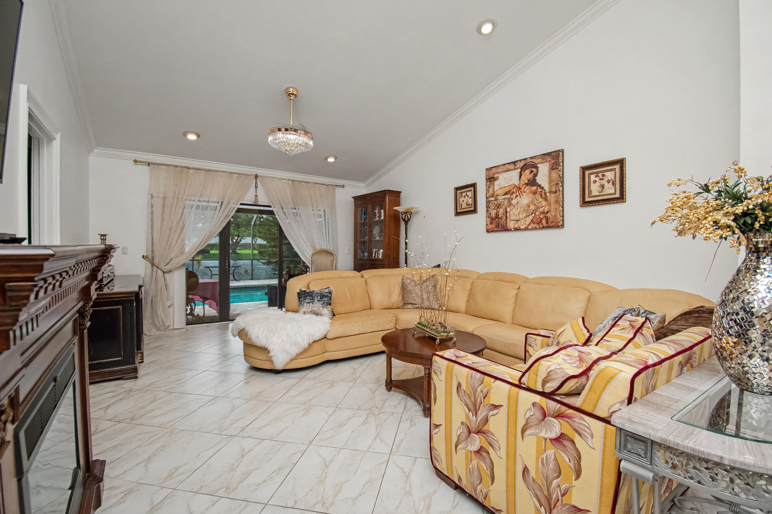 9708 Erica Court Boca Raton, FL 33496 - Photo 11 of 54 a living room with furniture and a wooden floor