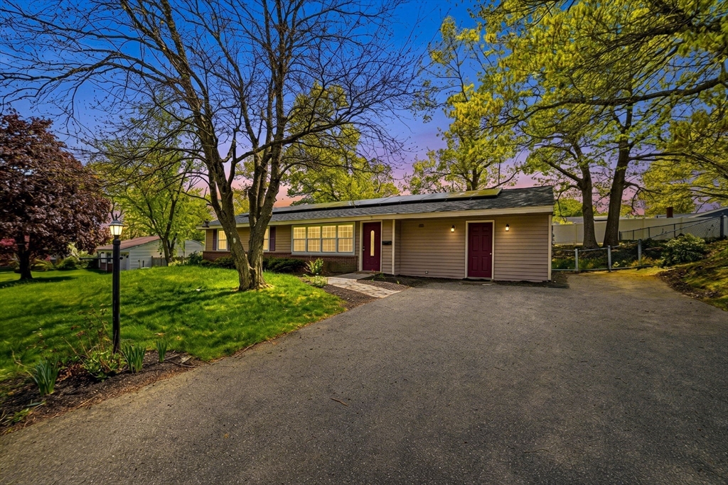 157 Errol Road Brockton, MA 02302 - Photo 2 of 34 a view of a house with a tree in the background