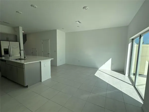 a view of a kitchen with a sink
