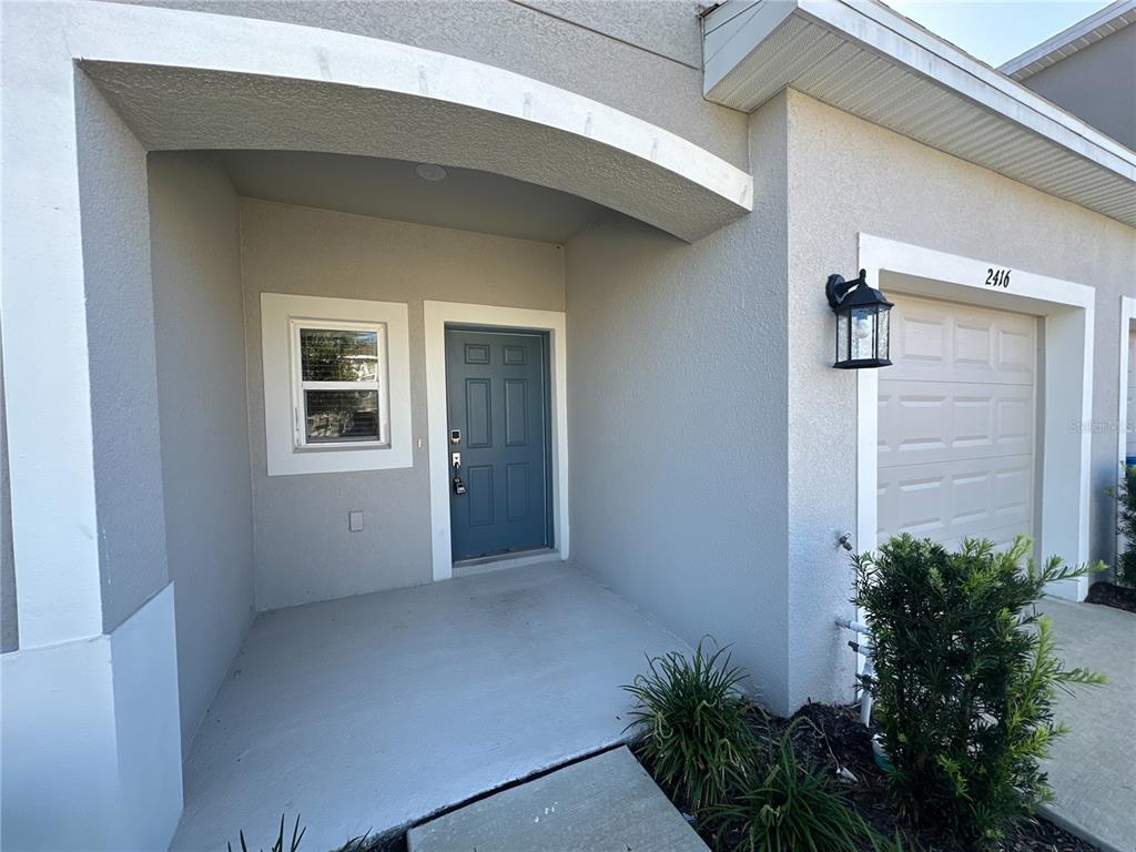 2416 Paravane Way Wesley Chapel, FL 33543 - Photo 3 of 35 a view of an empty room