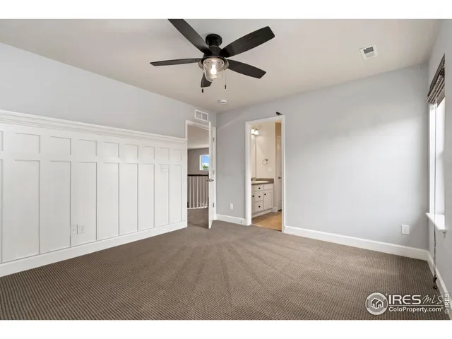 a kitchen with stainless steel appliances granite countertop a stove and a refrigerator