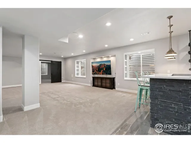 a view of a big room with wooden floor