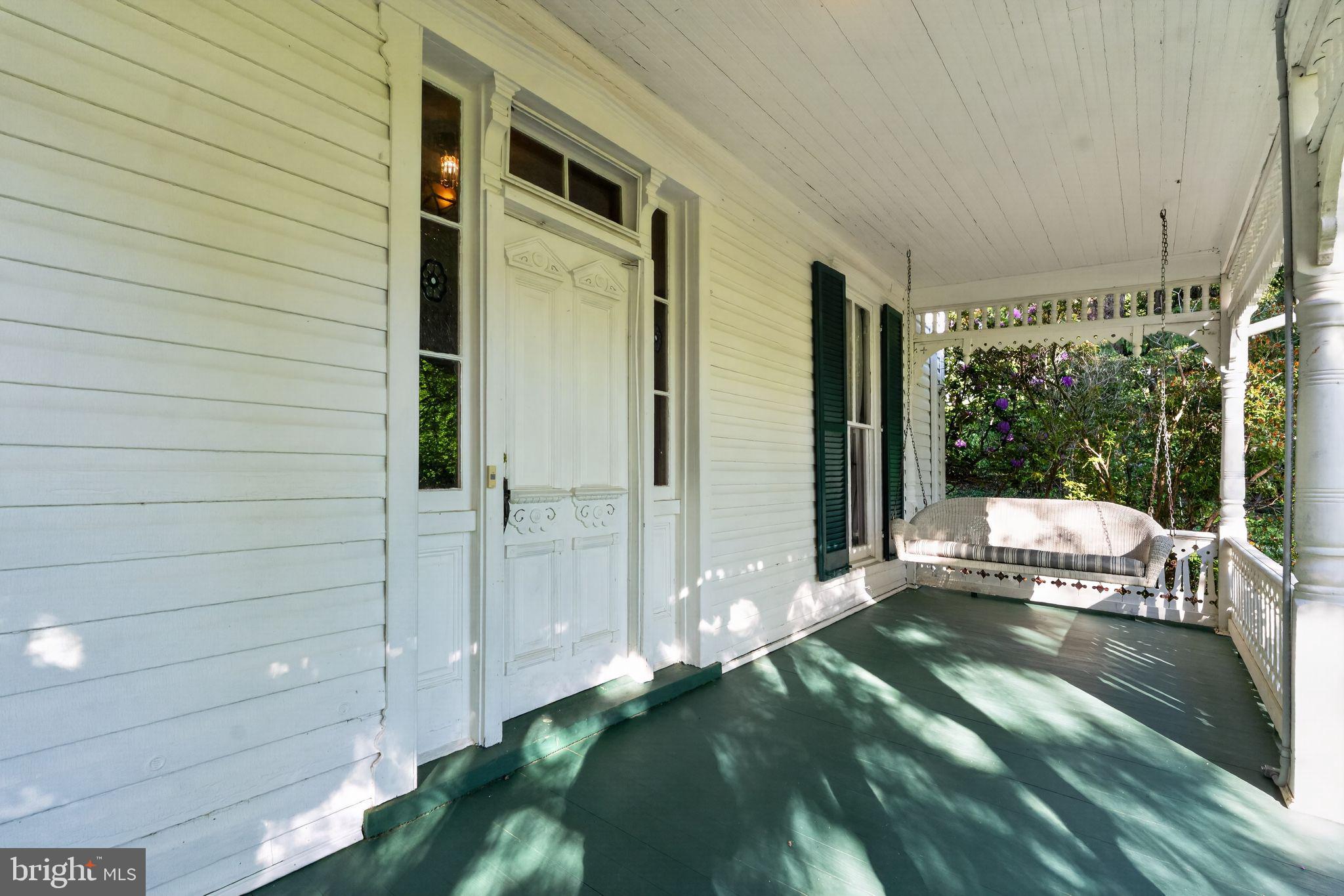 12000 Bethesda Church Road Damascus, MD 20872 - Photo 4 of 59 Inviting swing on front porch