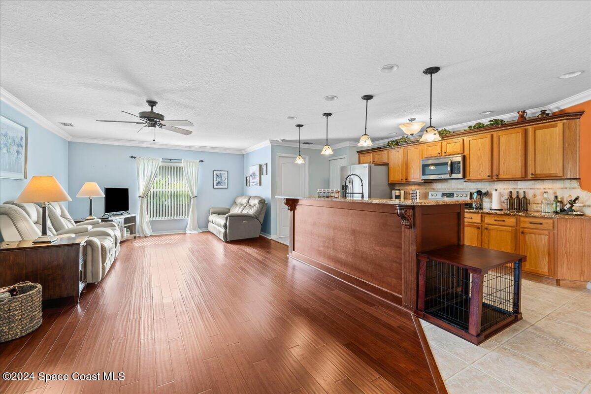 1952 Gloria Circle Palm Bay, FL 32905 - Photo 15 of 47 Family room - Kitchen