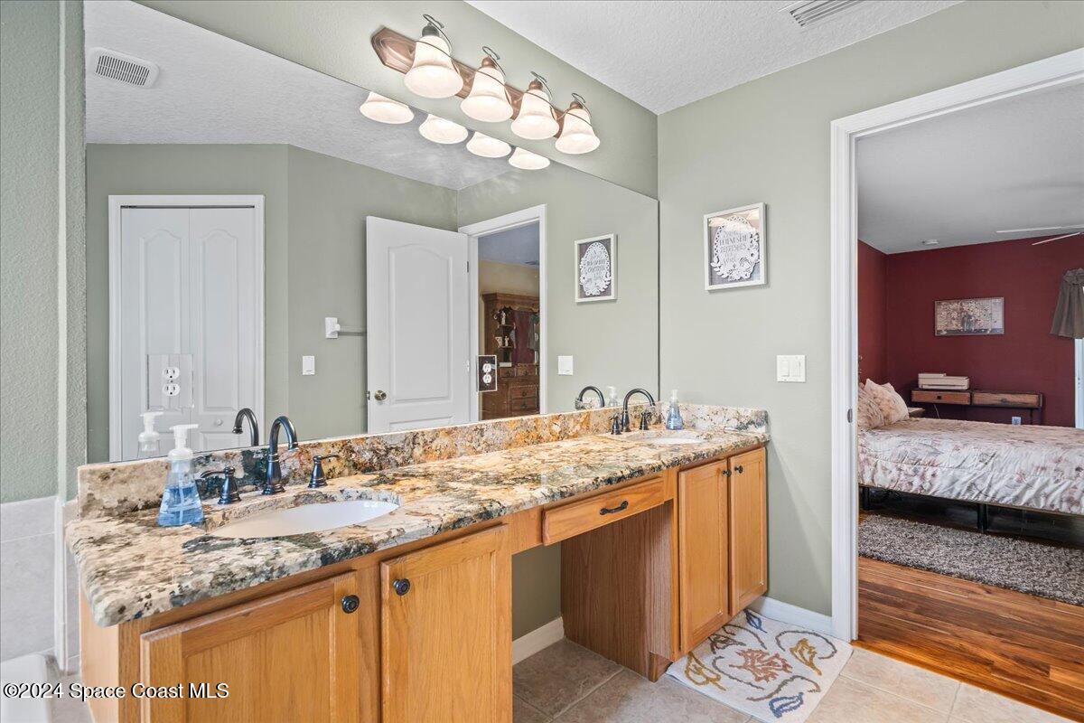 1952 Gloria Circle Palm Bay, FL 32905 - Photo 21 of 47 Deluxe owners suite bathroom