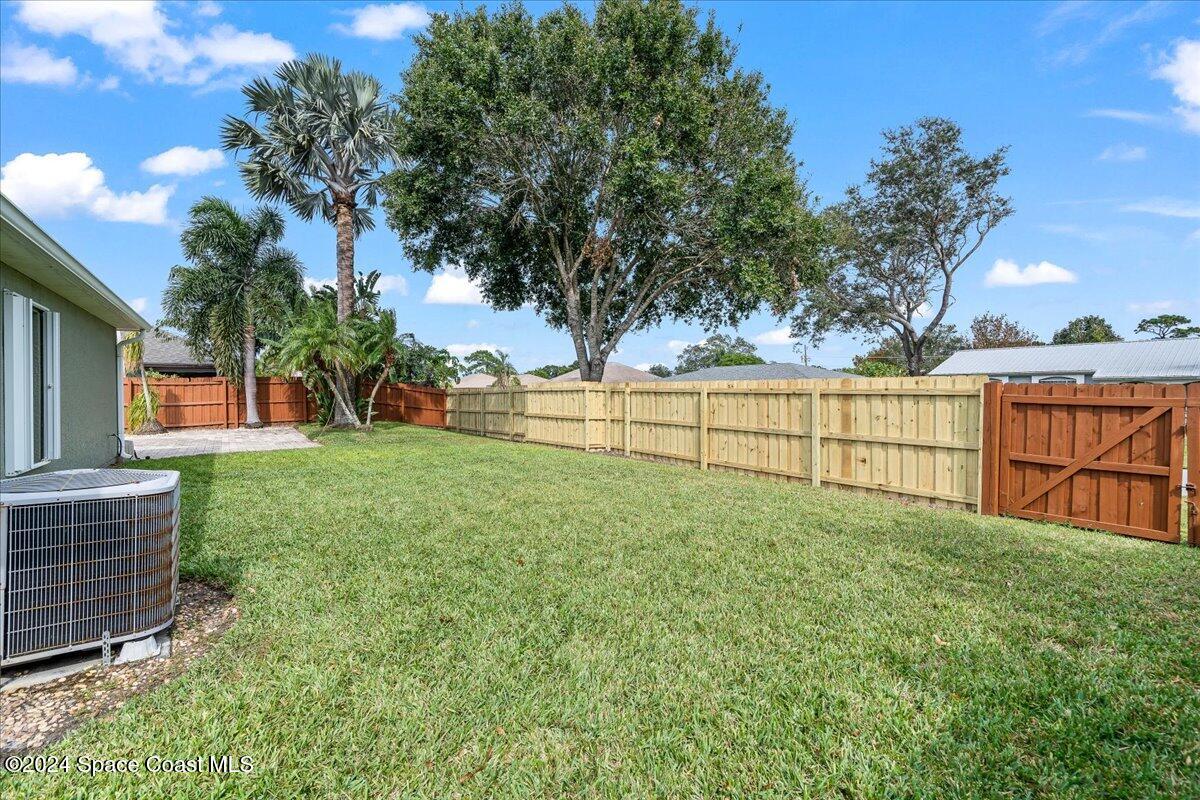 1952 Gloria Circle Palm Bay, FL 32905 - Photo 4 of 47 Fully Fenced Yard