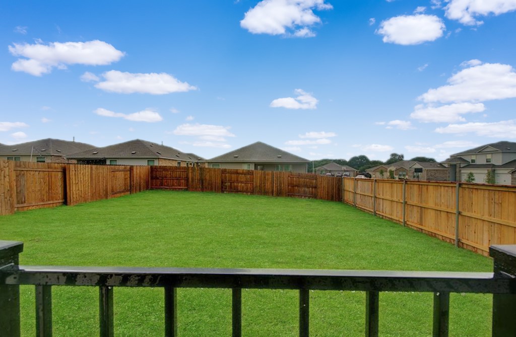 3453 Pauling Loop Round Rock, TX 78665 - Photo 15 of 28 a view of a backyard with a garden