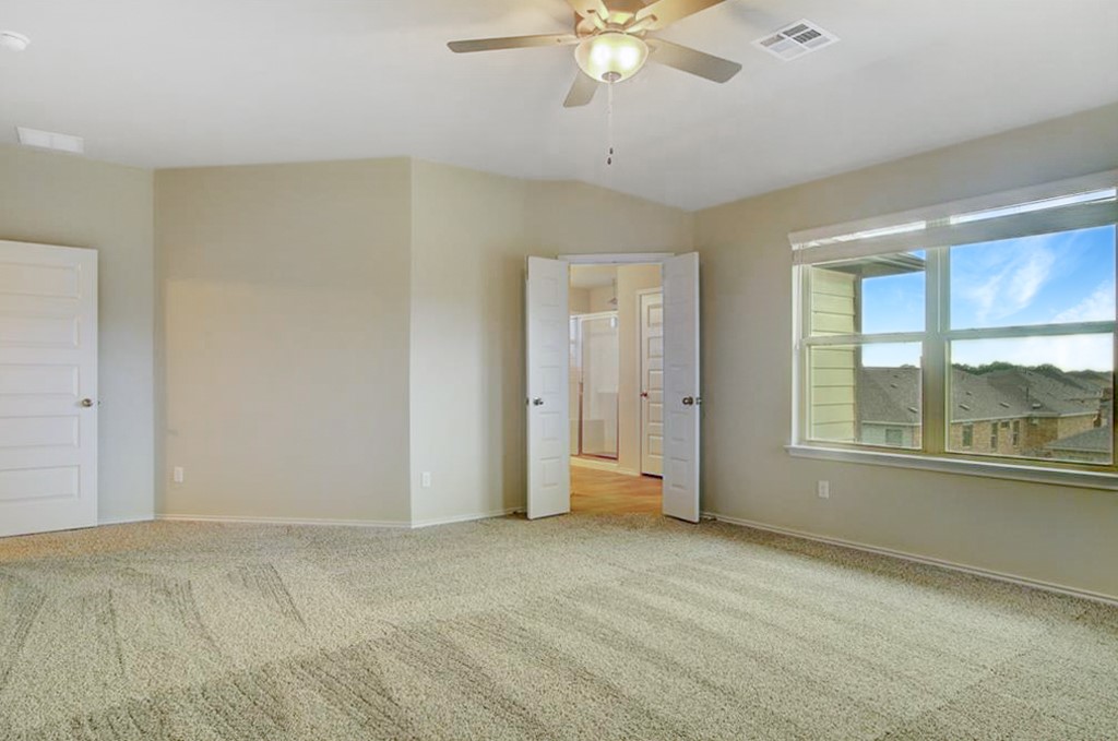 3453 Pauling Loop Round Rock, TX 78665 - Photo 17 of 28 a view of an empty room with a window