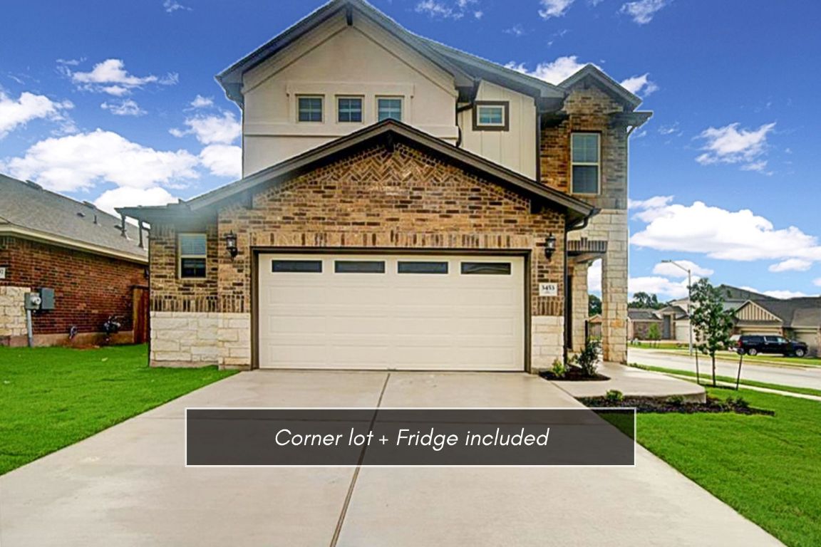 3453 Pauling Loop Round Rock, TX 78665 - Photo 2 of 28 a view of a house with a yard