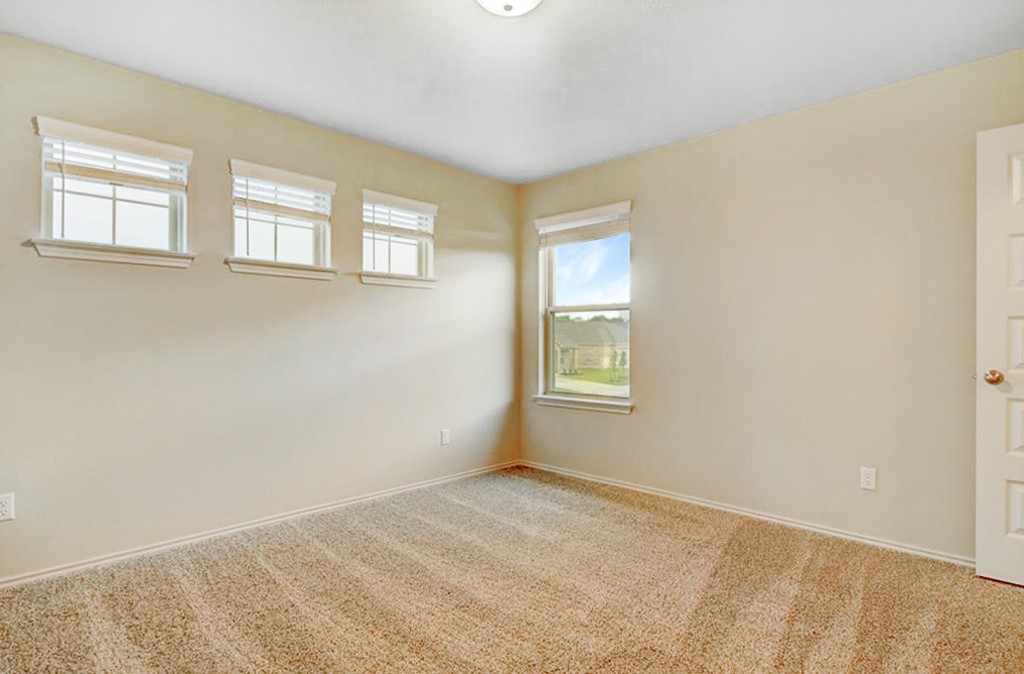 3453 Pauling Loop Round Rock, TX 78665 - Photo 23 of 28 a view of an empty room with a window
