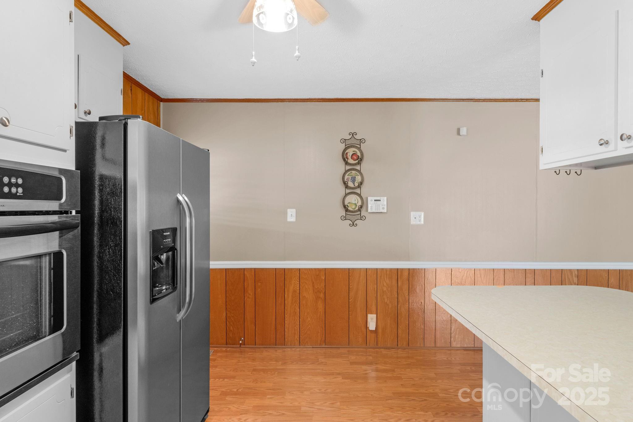 2036 Biggers Lake Road Shelby, NC 28152 - Photo 14 of 45 a kitchen with stainless steel appliances granite countertop a refrigerator and a stove