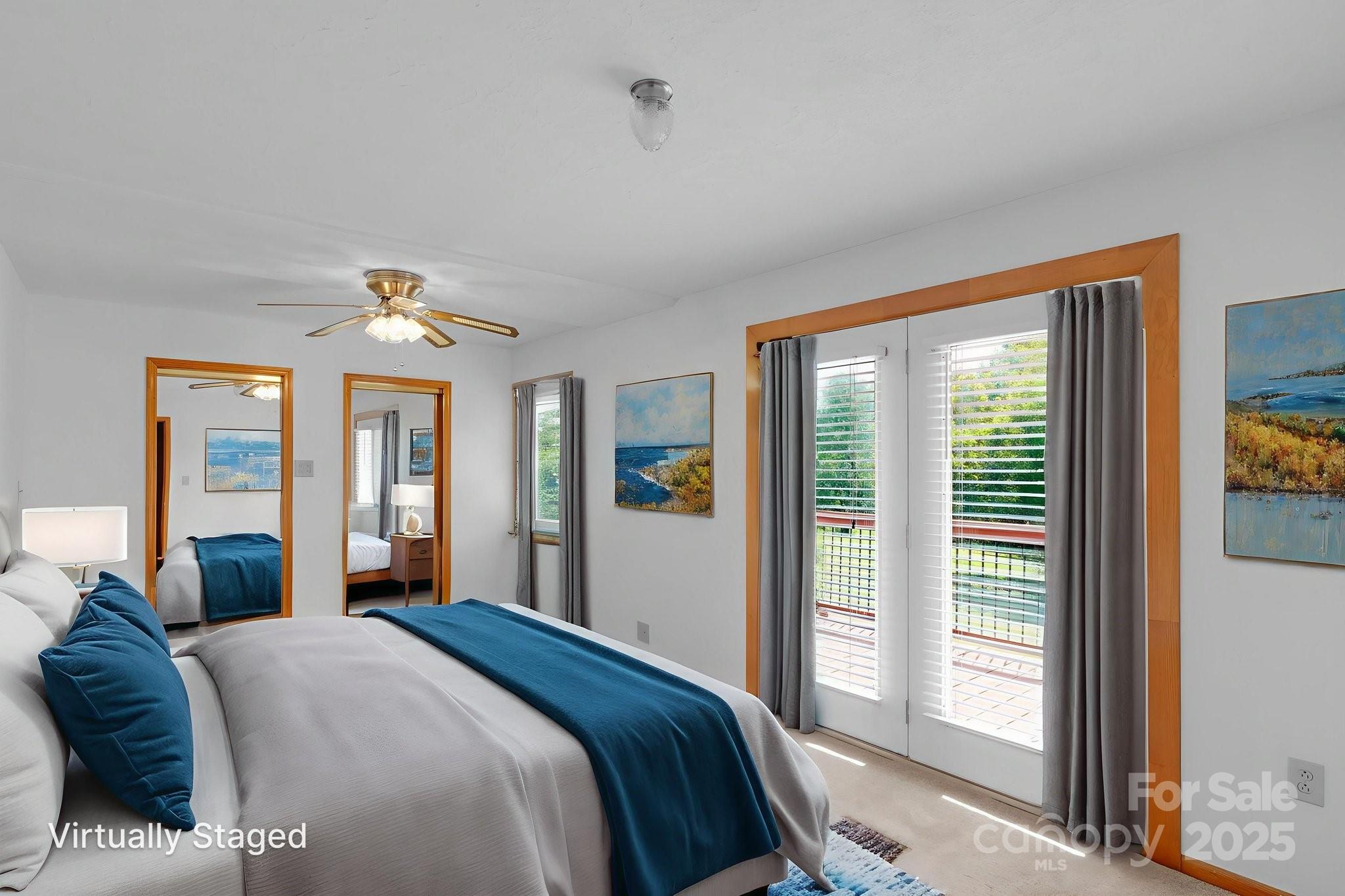 2036 Biggers Lake Road Shelby, NC 28152 - Photo 18 of 45 a bedroom with a large bed and a large window