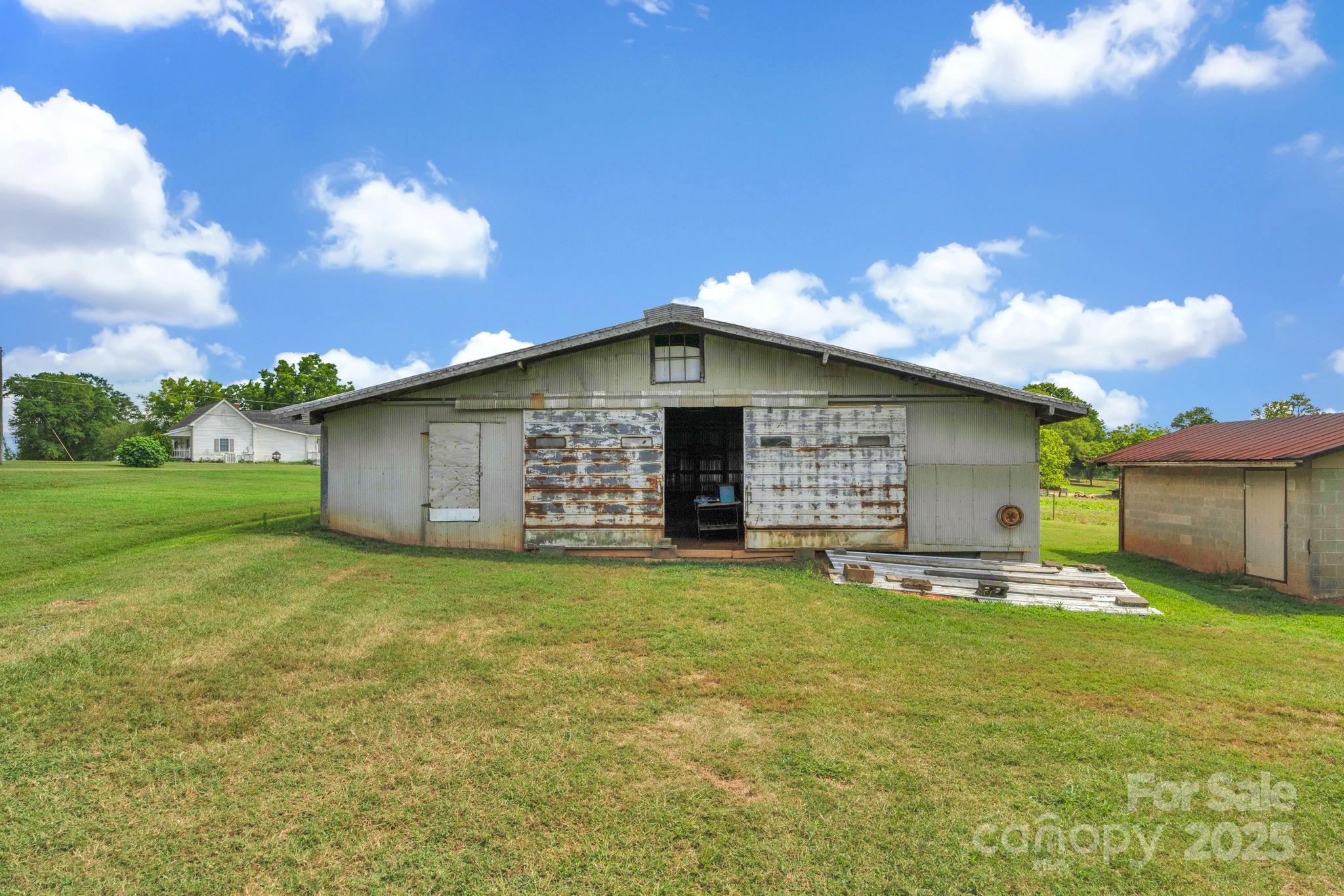 2036 Biggers Lake Road Shelby, NC 28152 - Photo 29 of 45 a view of a house with a yard