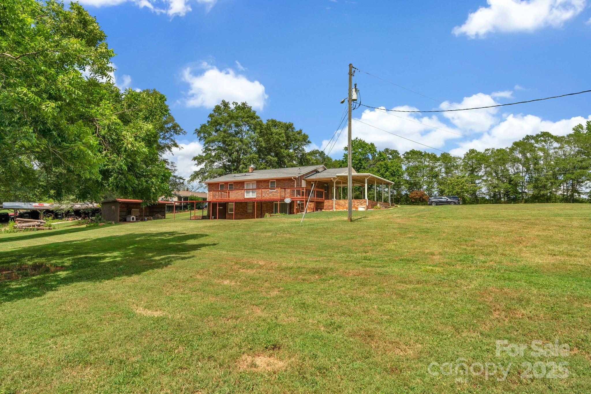 2036 Biggers Lake Road Shelby, NC 28152 - Photo 34 of 45 a front view of a house with a yard