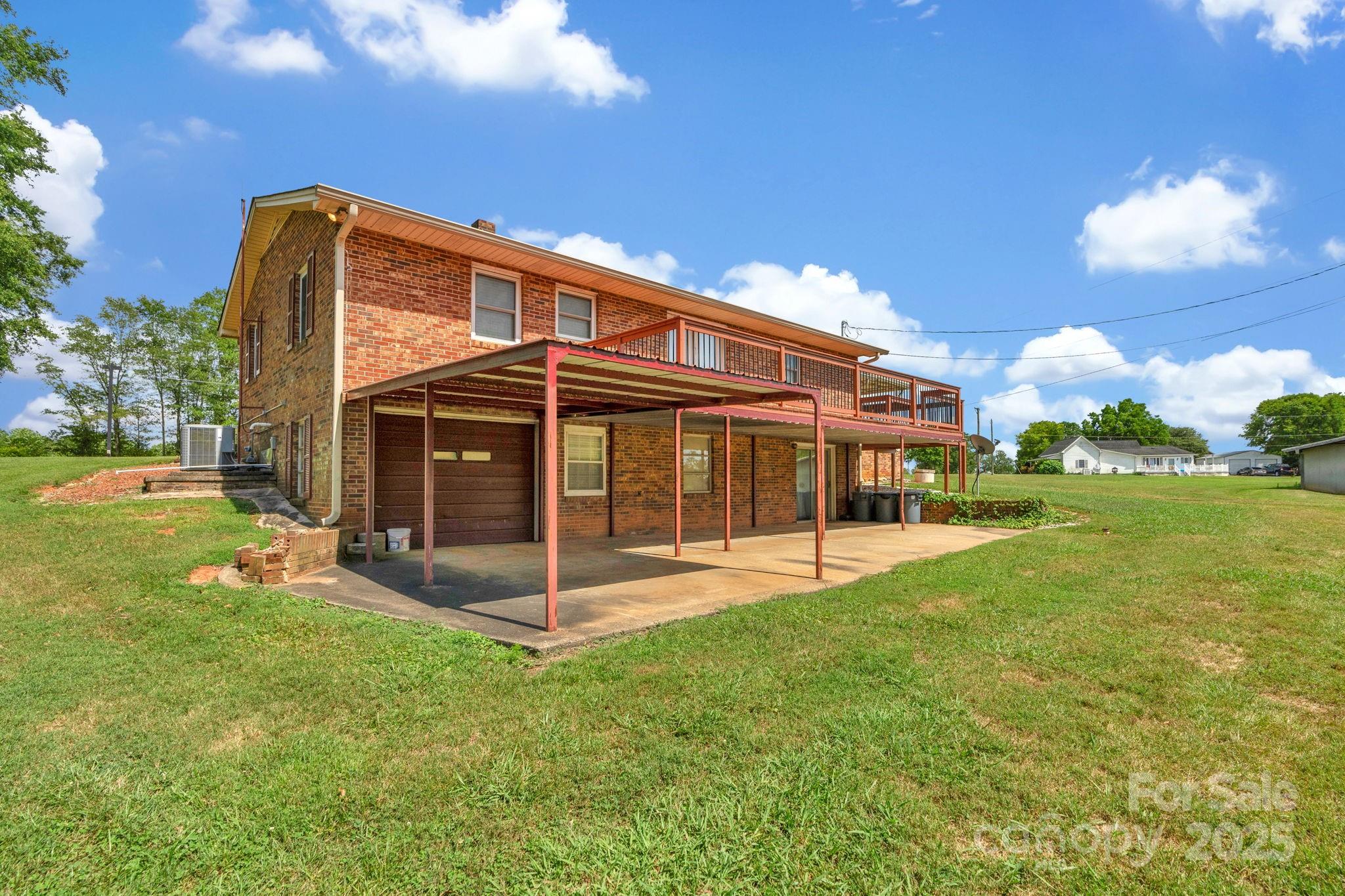 2036 Biggers Lake Road Shelby, NC 28152 - Photo 35 of 45 a view of a house with a backyard