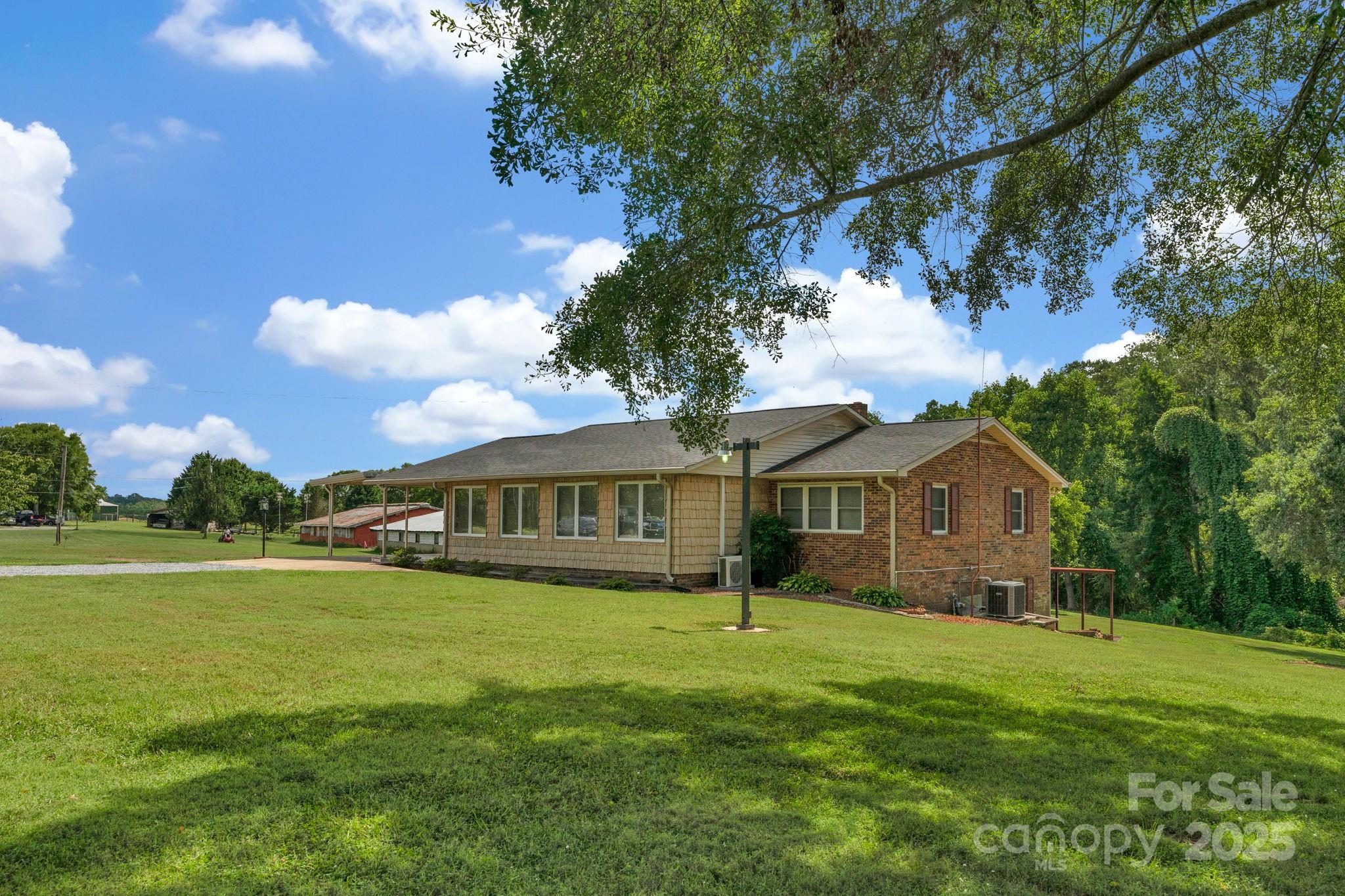 2036 Biggers Lake Road Shelby, NC 28152 - Photo 5 of 45 a view of a house with a big yard