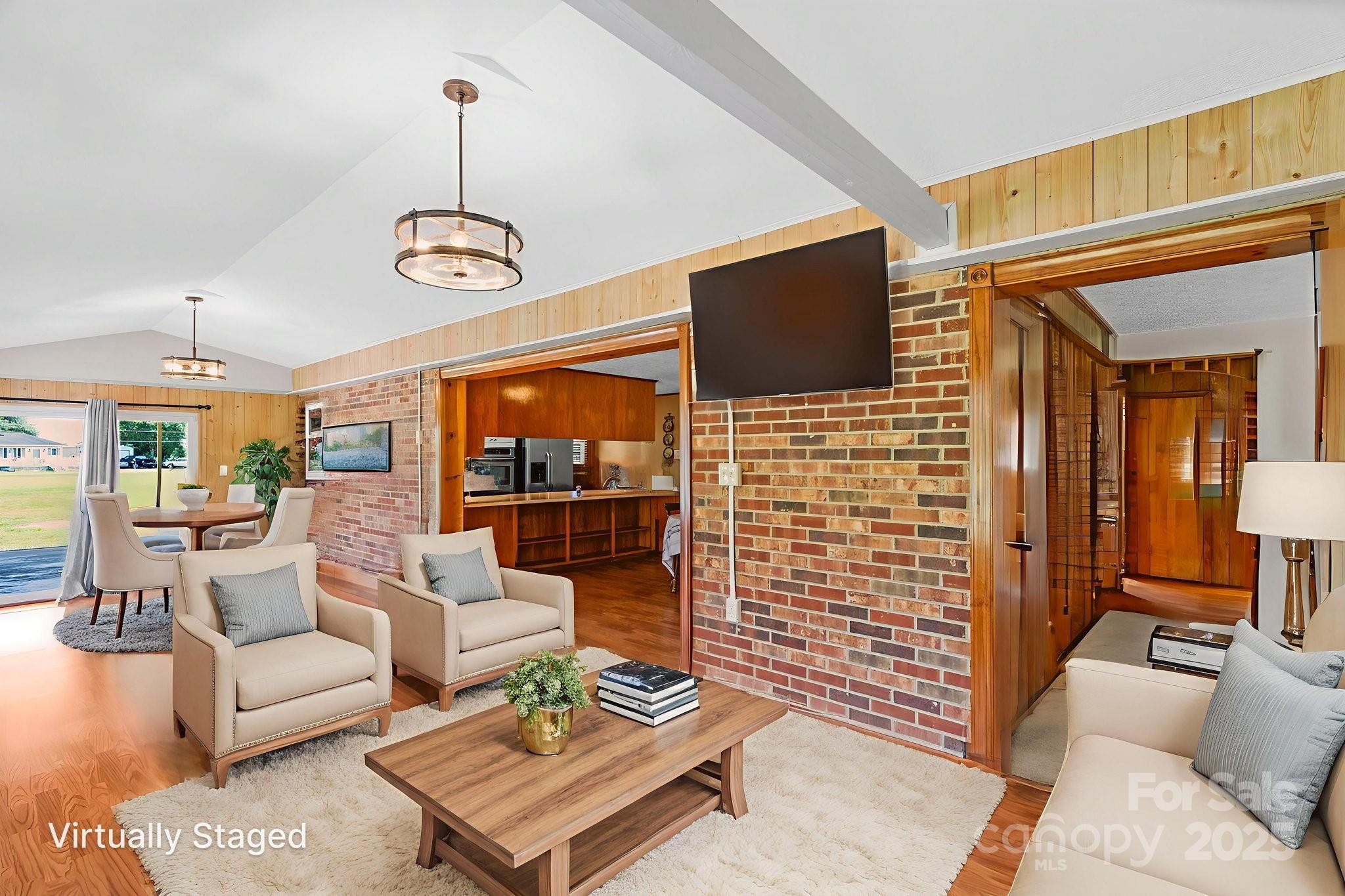 2036 Biggers Lake Road Shelby, NC 28152 - Photo 7 of 45 a living room with patio couch and a flat screen tv