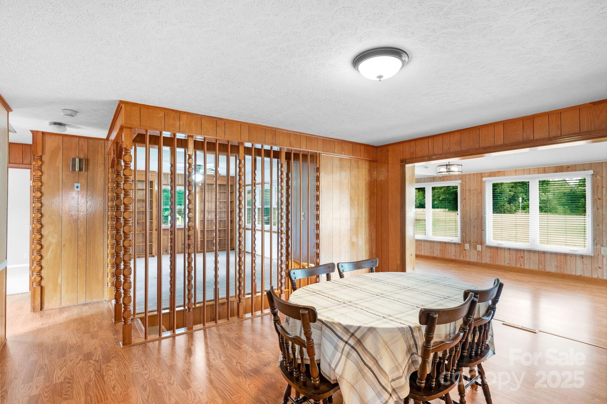 2036 Biggers Lake Road Shelby, NC 28152 - Photo 9 of 45 a view of a dining room with furniture window and wooden floor