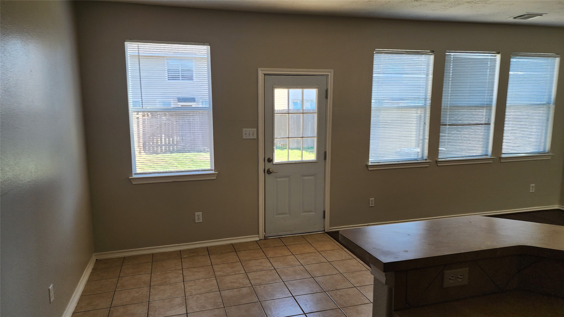11428 Hackmatack Way Houston, TX 77066 - Photo 15 of 49 an empty room with windows